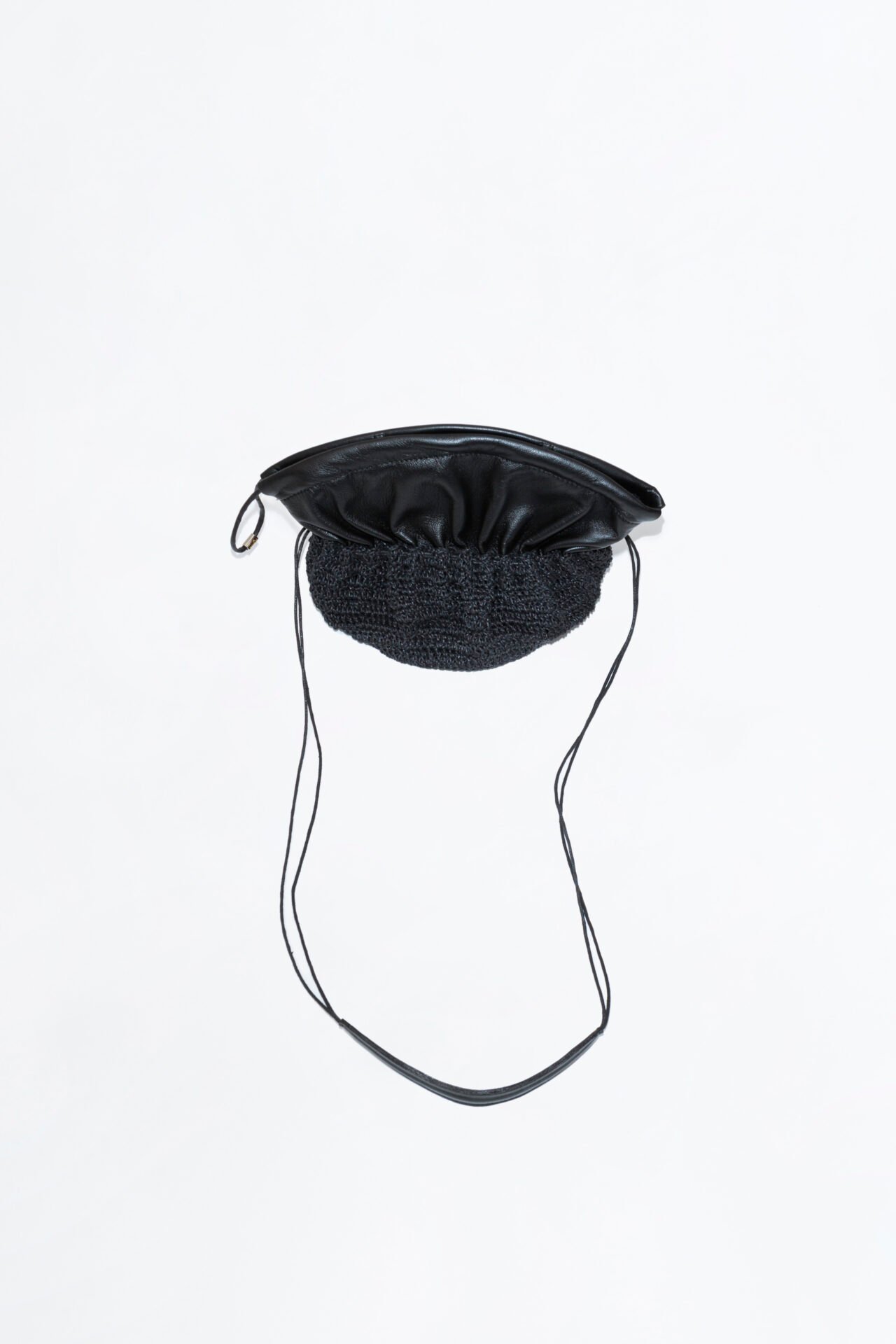 Carterita Pared tejida a mano con hilo de algodón encerado y fuelle de cuero de oveja.